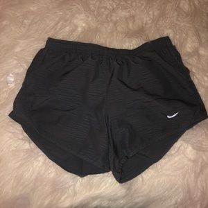 Gray Nike dry-fit running shorts